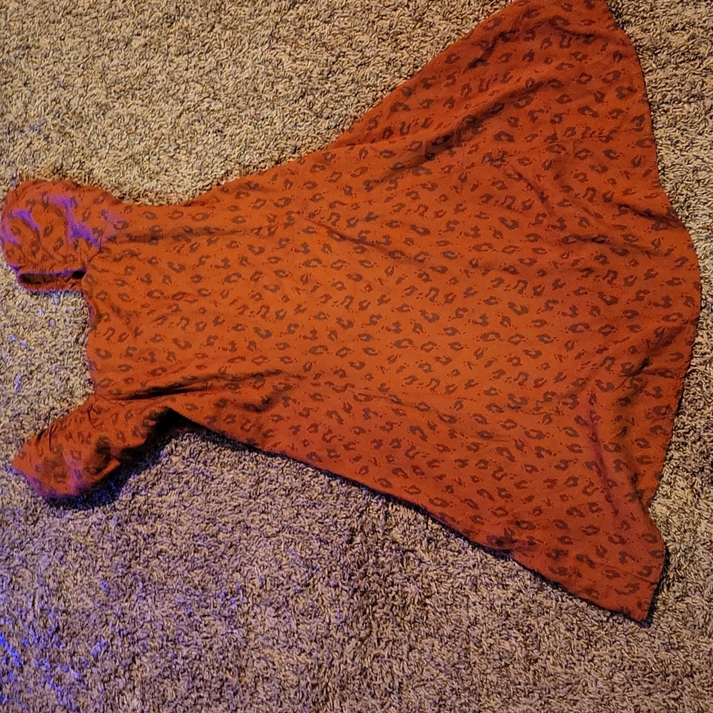 Beautiful rust orange color leopard print dress